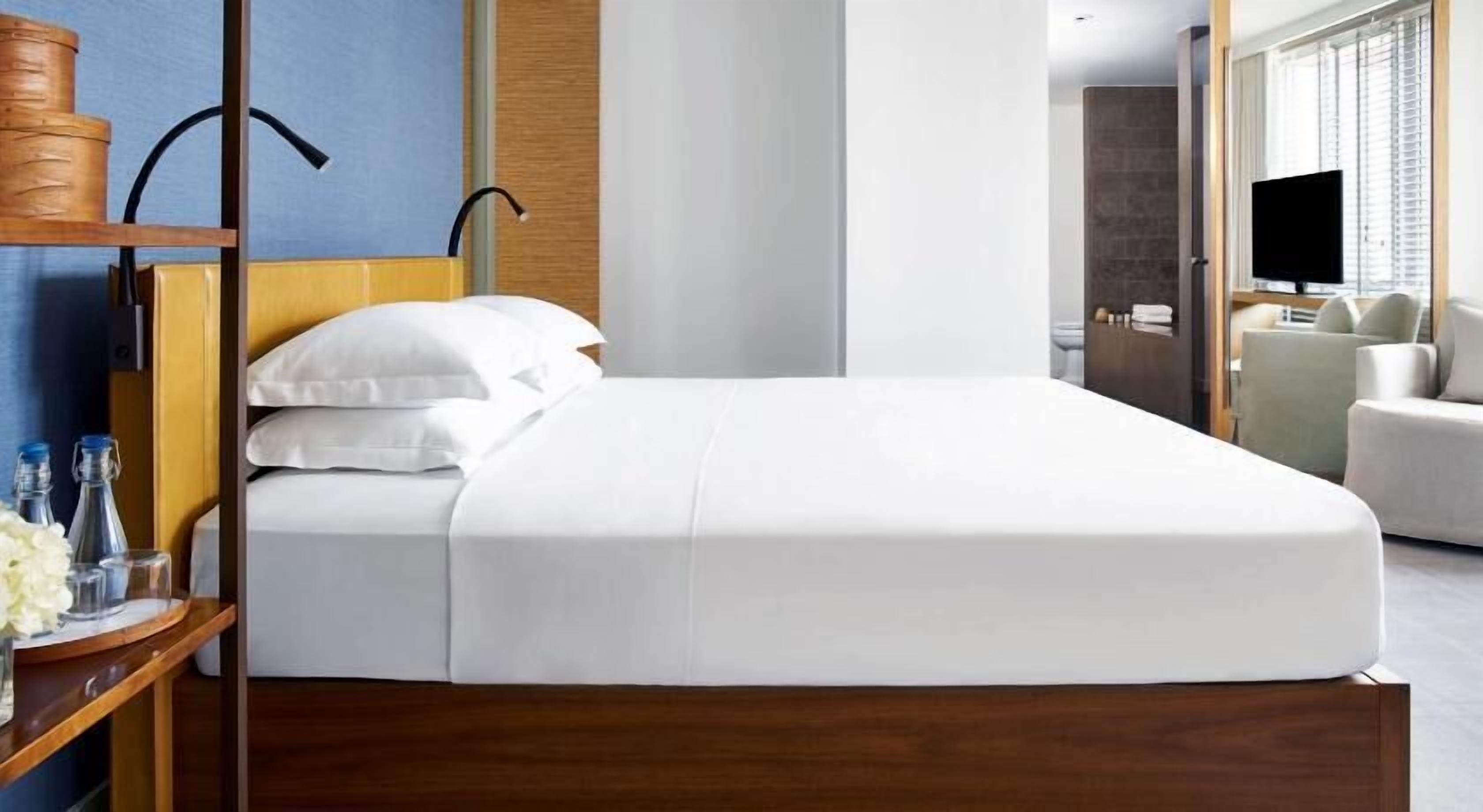 Premium bedding, down comforters, pillowtop beds, minibar
