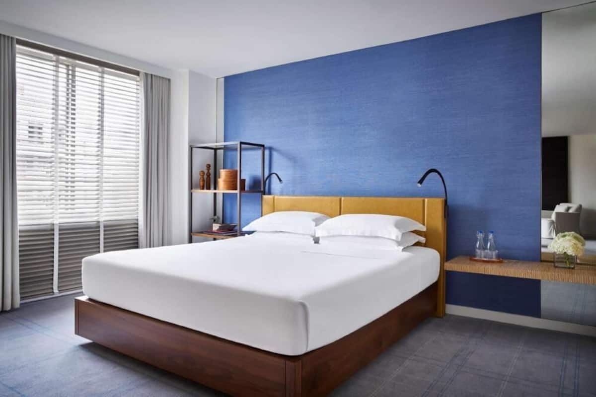 Premium bedding, down comforters, pillowtop beds, minibar