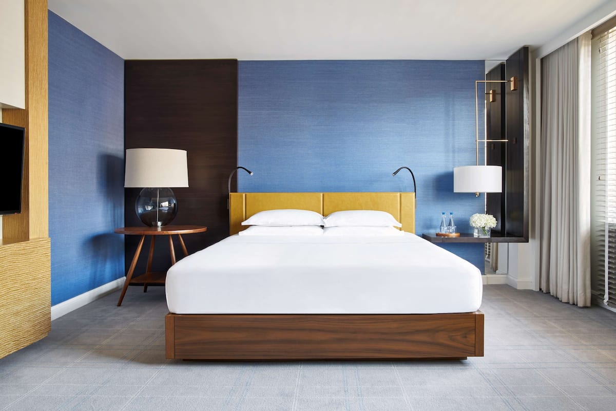 Premium bedding, down comforters, pillowtop beds, minibar