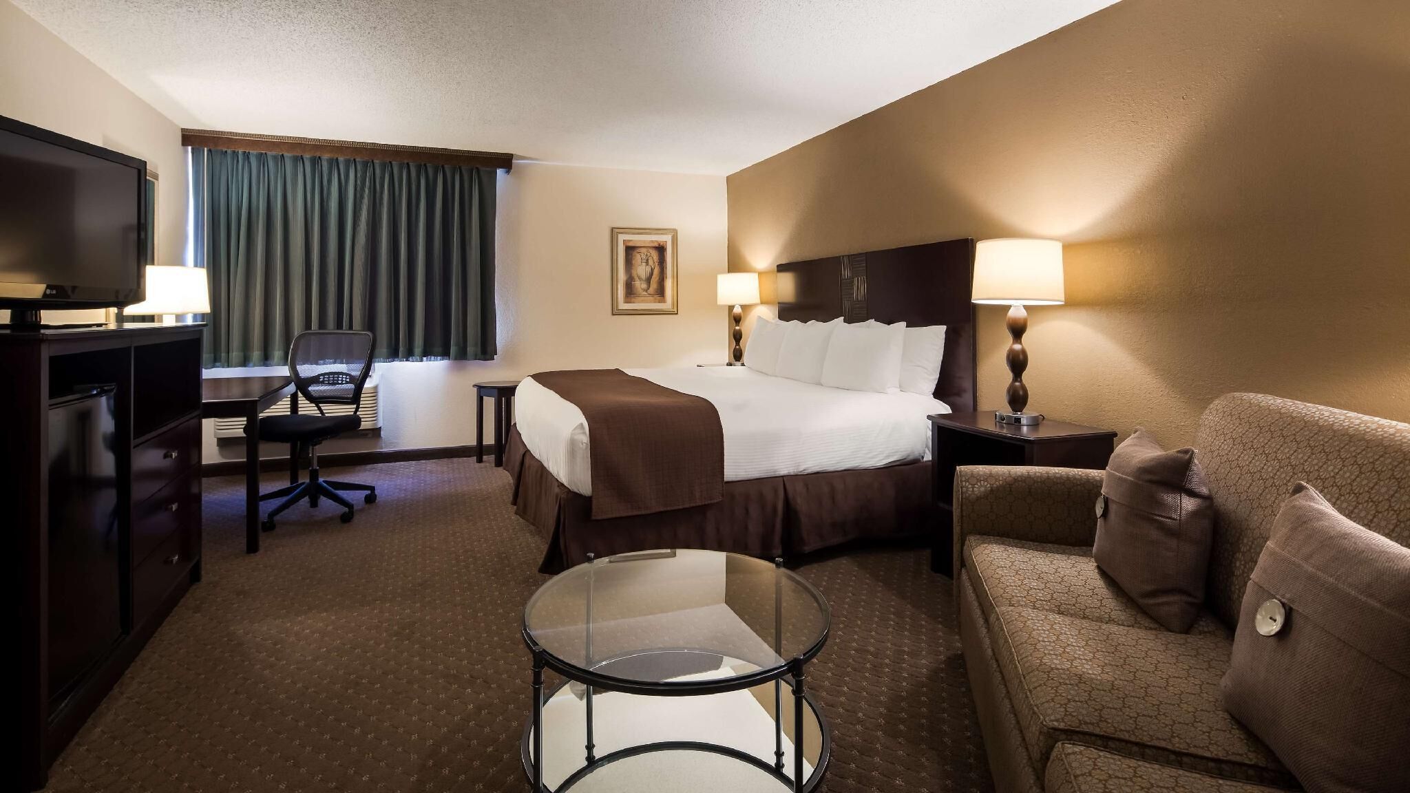 Hypo-allergenic bedding, down comforters, desk, blackout drapes