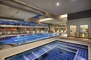 Indoor pool, pool umbrellas, sun loungers