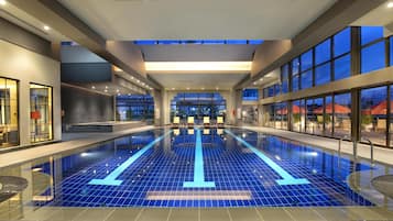 Indoor pool, pool umbrellas, sun loungers