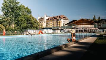 Indoor pool, pool umbrellas, pool loungers