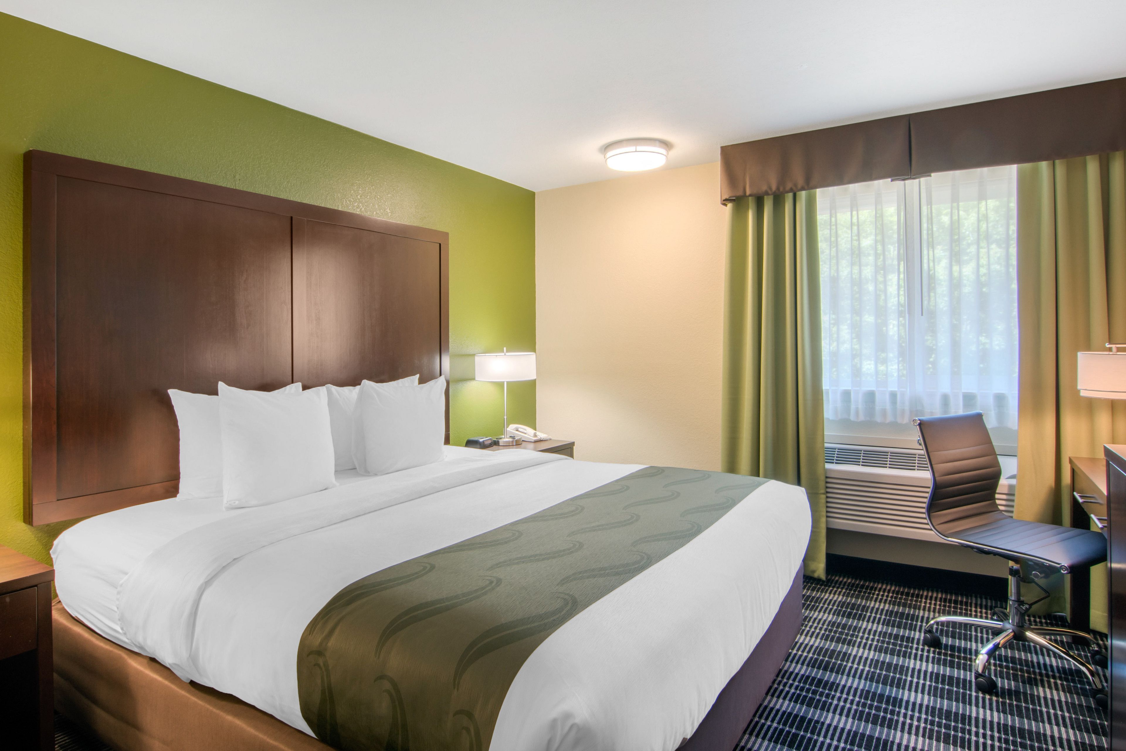 Premium bedding, desk, blackout drapes, iron/ironing board