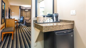 A hotel room with a kitchenette, a dining area with a chair and table, and a large mirror. - Royal Hotel West Edmonton, Trademark Collection by Wyndham (Edmonton)