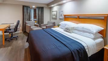 Hypo-allergenic bedding, pillow-top beds, desk, blackout curtains