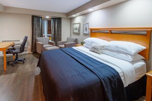 Hypo-allergenic bedding, pillowtop beds, desk, blackout drapes