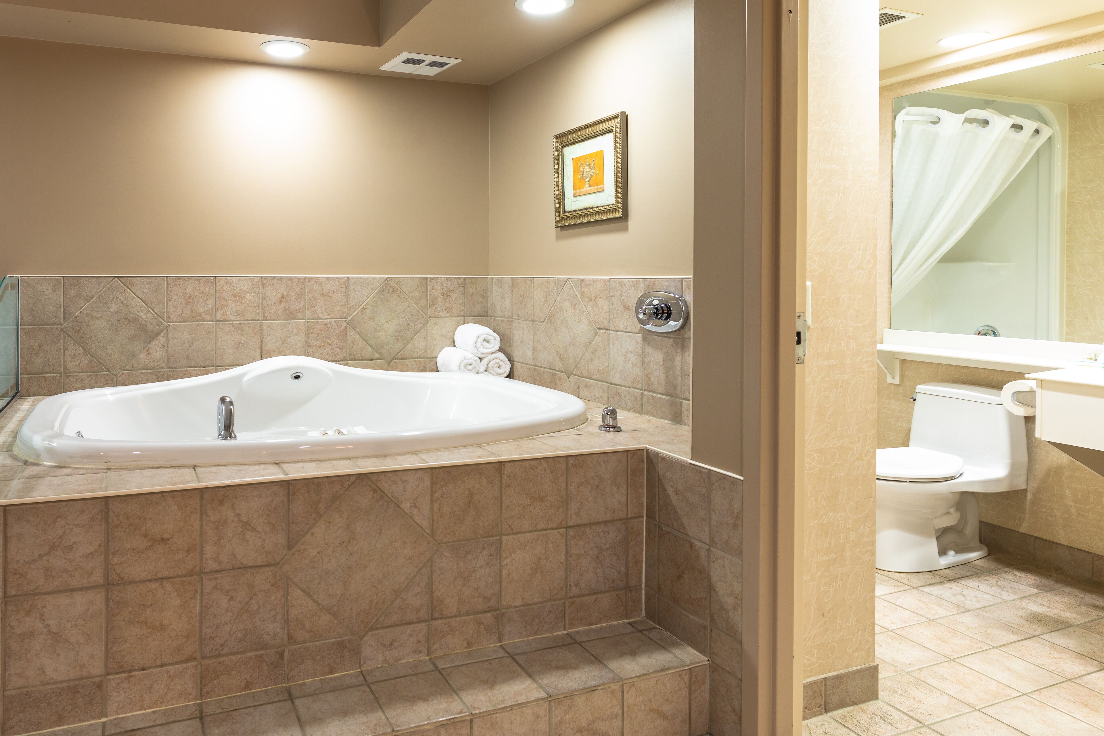 deluxe suite, 1 king bed, non smoking | jetted bathtub