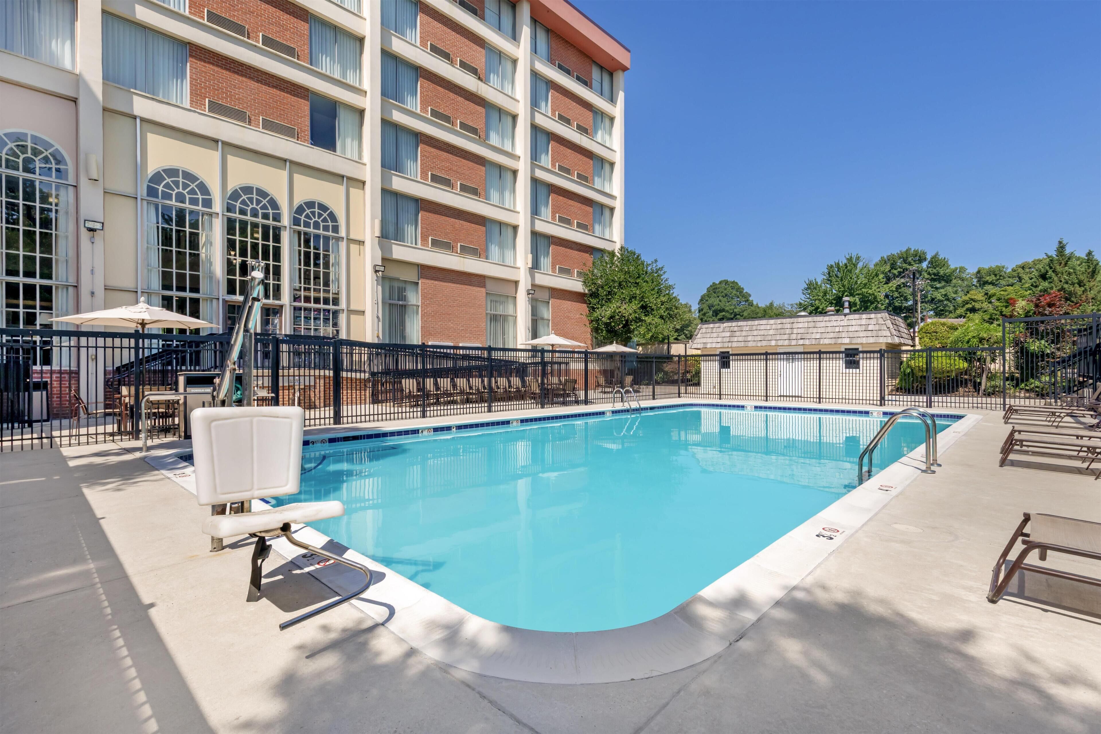 Seasonal outdoor pool, pool umbrellas, pool loungers