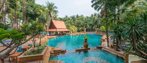 Outdoor pool, open 6:00 AM to 8:00 PM, pool umbrellas