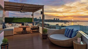 Sea View Corner Suite | Minibar, in-room safe, desk, laptop workspace