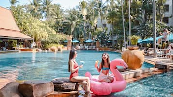 Outdoor pool, open 6:00 AM to 8:00 PM, pool umbrellas