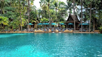 Outdoor pool, open 6:00 AM to 8:00 PM, pool umbrellas