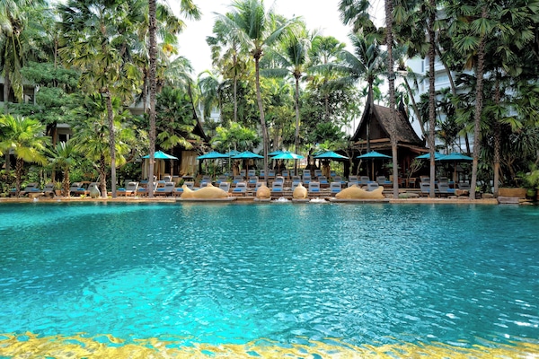 Outdoor pool, open 6:00 AM to 8:00 PM, pool umbrellas