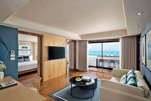 One Bedroom Sea View Suite | Minibar, in-room safe, desk, laptop workspace