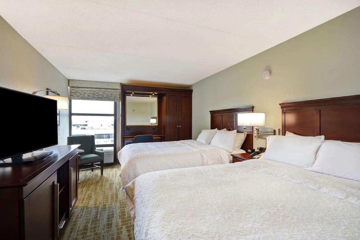 Room, 2 Queen Beds, Non Smoking, Refrigerator & Microwave | Blackout drapes, iron/ironing board, free cribs/infant beds, free WiFi