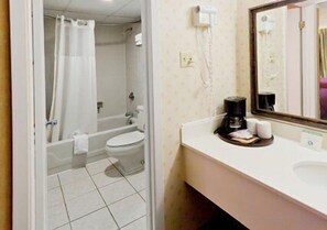 Bathtub, hair dryer, towels