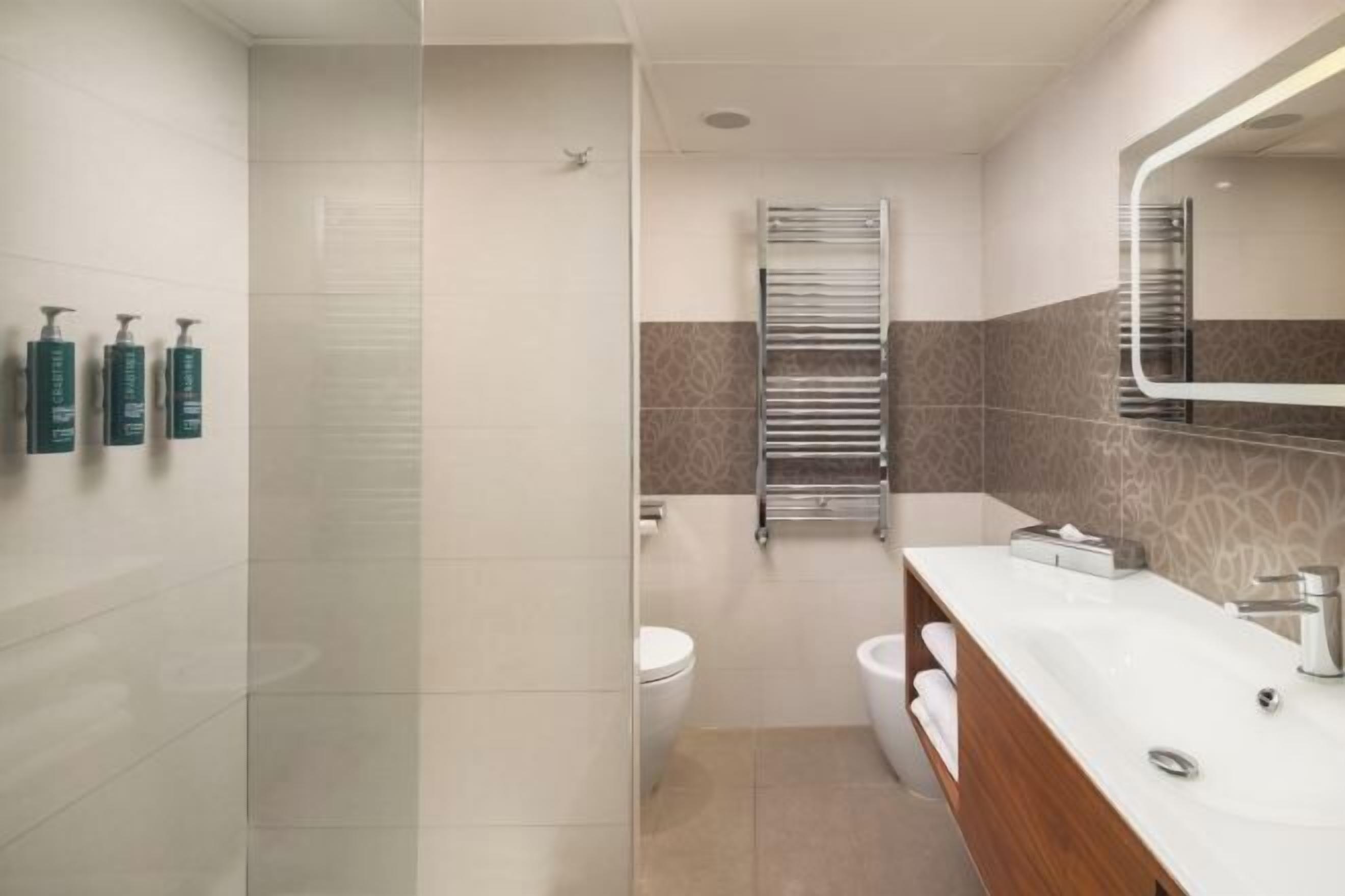 Bathroom | Designer toiletries, hair dryer, bidet, towels