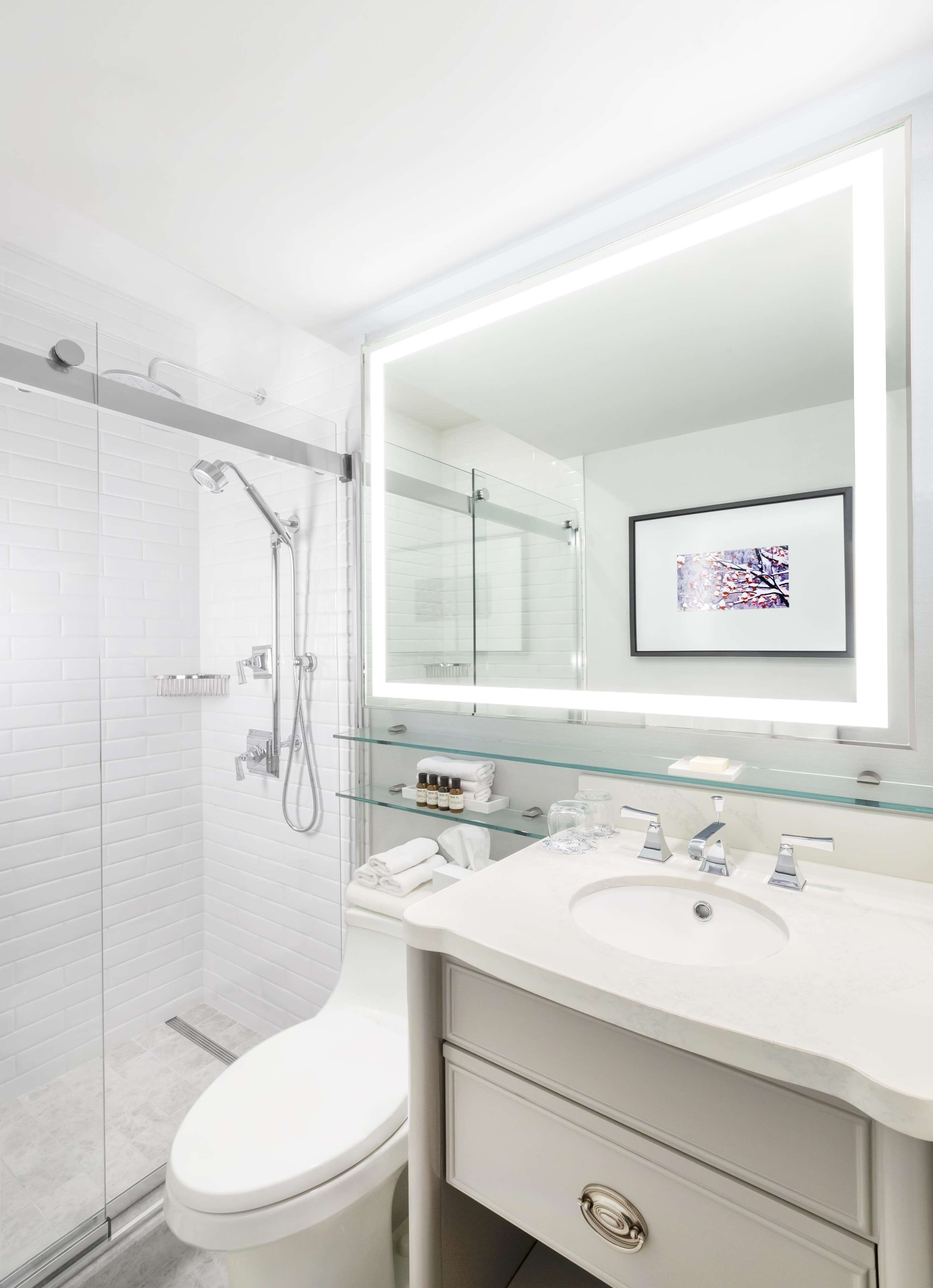 designer toiletries, hair dryer, bathrobes, towels