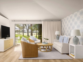 Two Bedroom Cottage King | Premium bedding, pillowtop beds, in-room safe, desk at PGA National Resort 