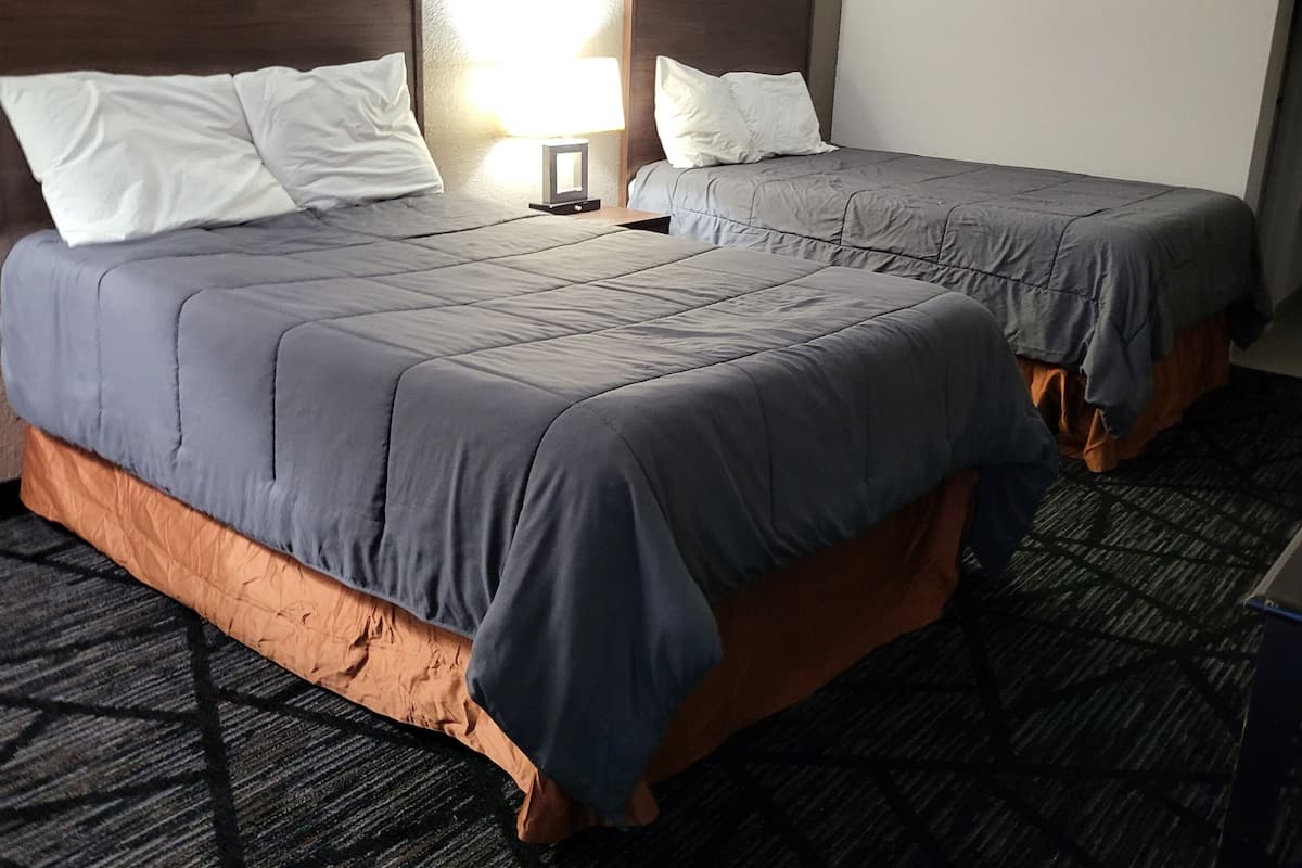 Premium bedding, down duvets, Select Comfort beds, in-room safe
