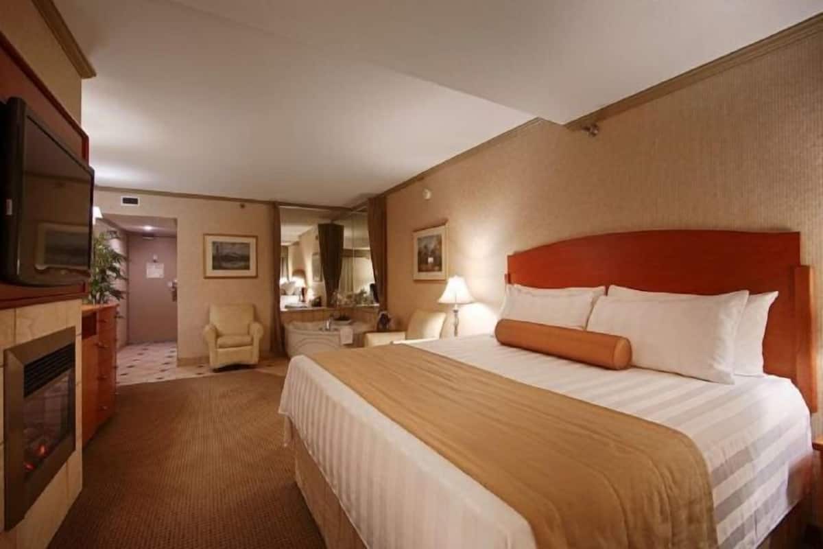 Laptop workspace, blackout drapes, iron/ironing board