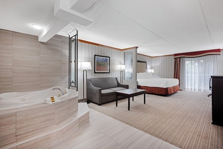 Standard Room, 1 King Bed, Non Smoking, Jetted Tub | Laptop workspace, blackout drapes, iron/ironing board. Best Western Plus Port O'Call Hotel