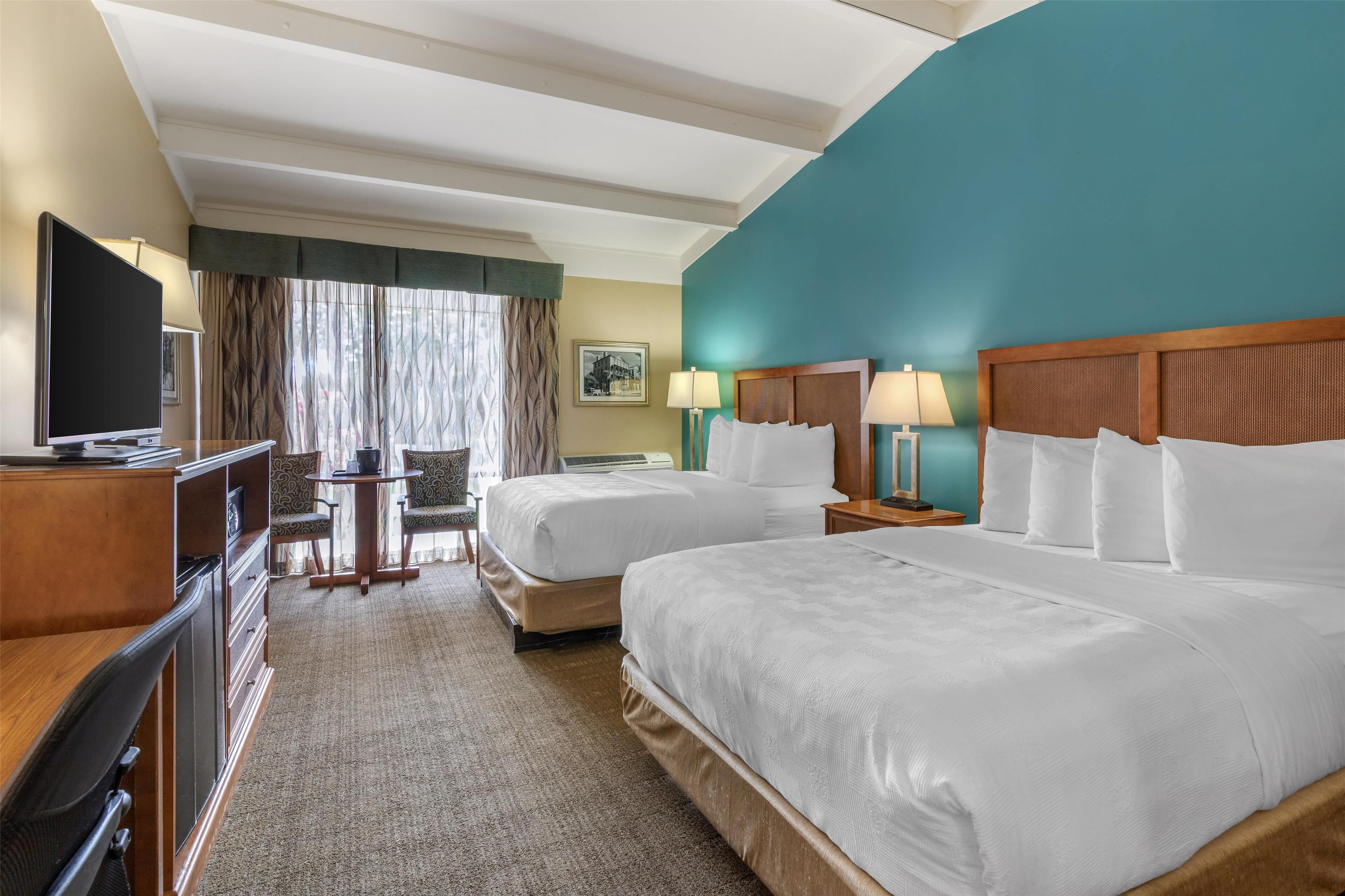 standard room, 2 queen beds, non smoking, refrigerator & microwave | 1 bedroom, pillow-top beds, in-room safe, blackout curtains