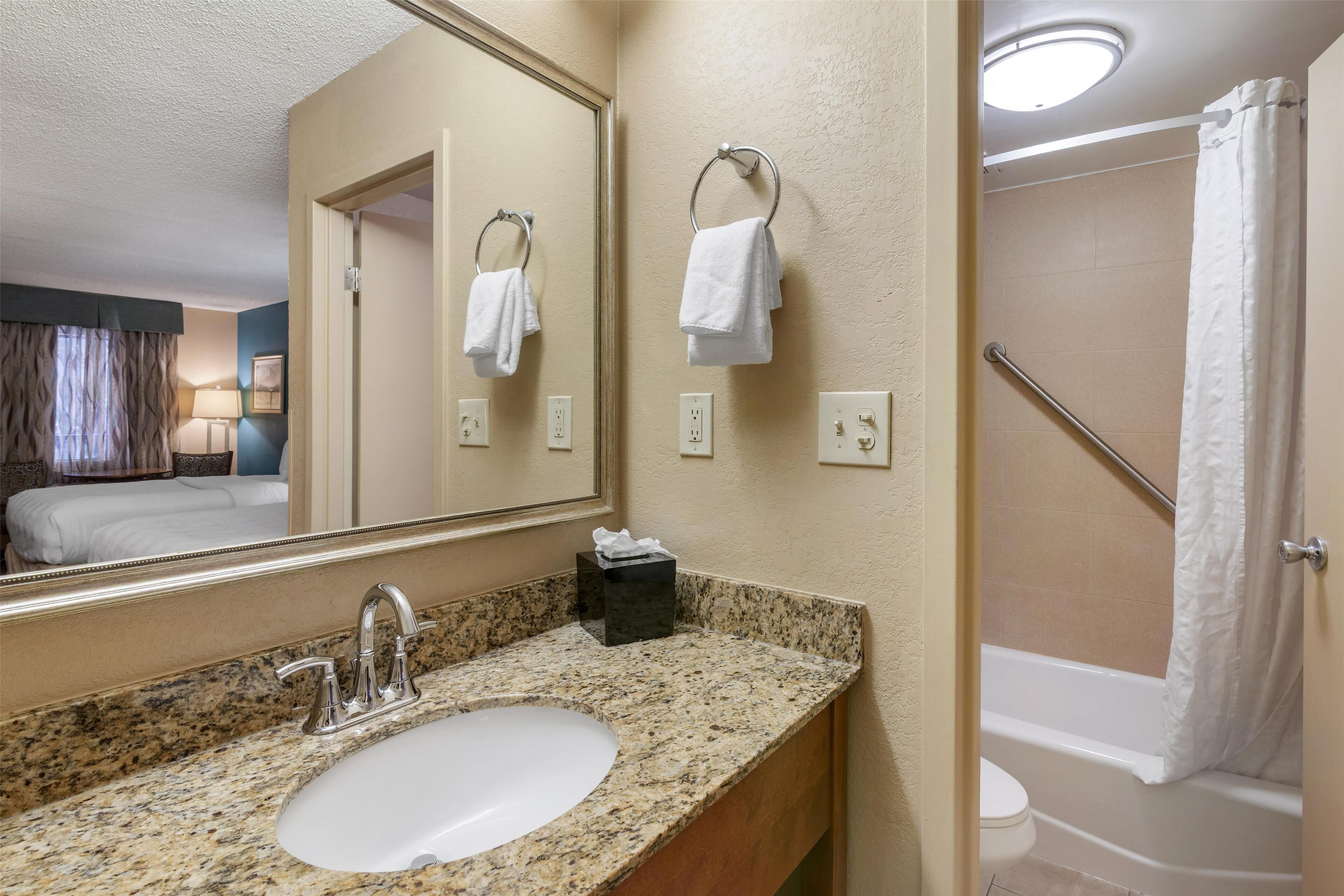 standard room, 2 double beds, non smoking, refrigerator & microwave | bathroom | combined shower/bathtub, free toiletries, hair dryer, towels