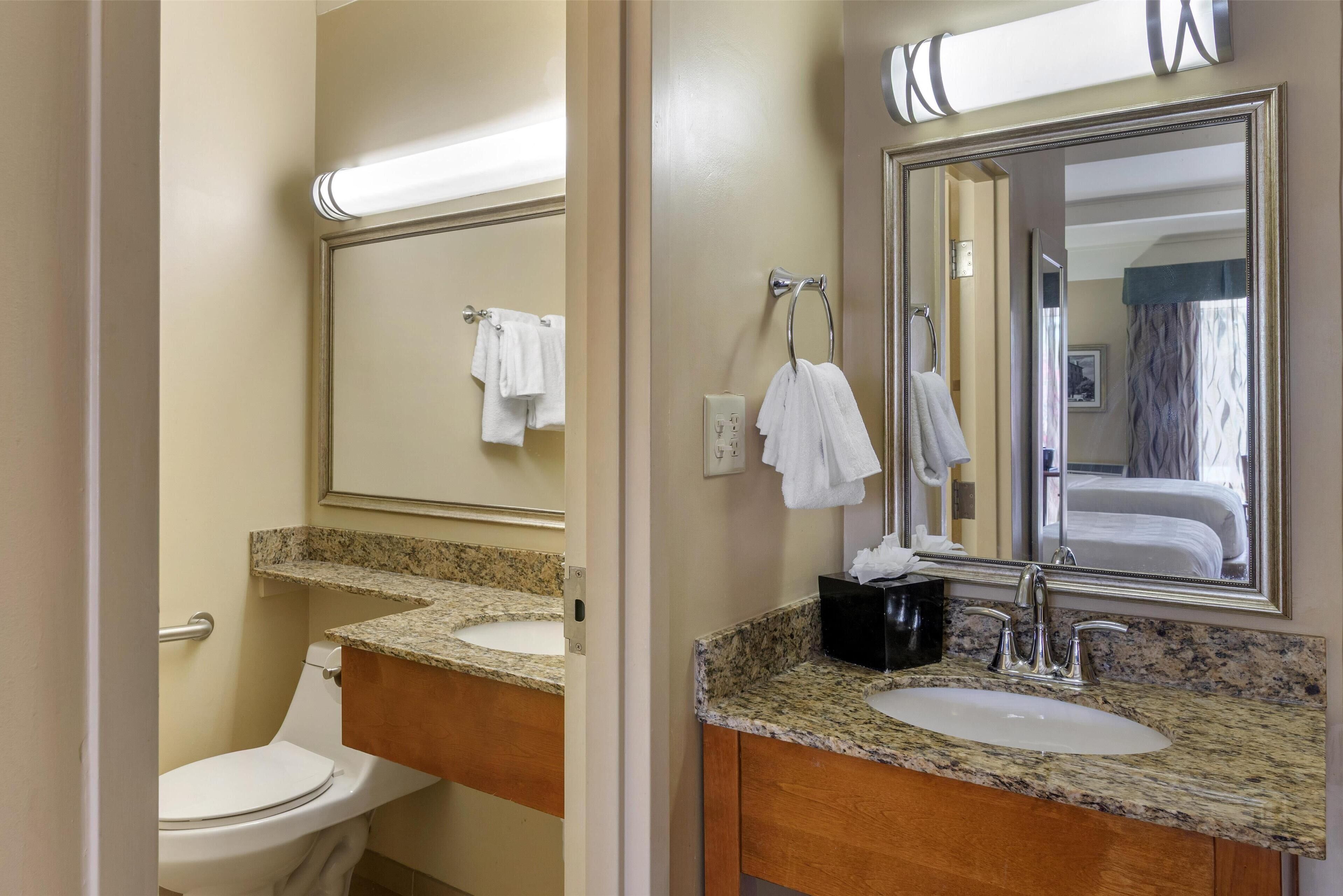 standard room, 2 queen beds, non smoking, refrigerator & microwave | bathroom | combined shower/bathtub, free toiletries, hair dryer, towels