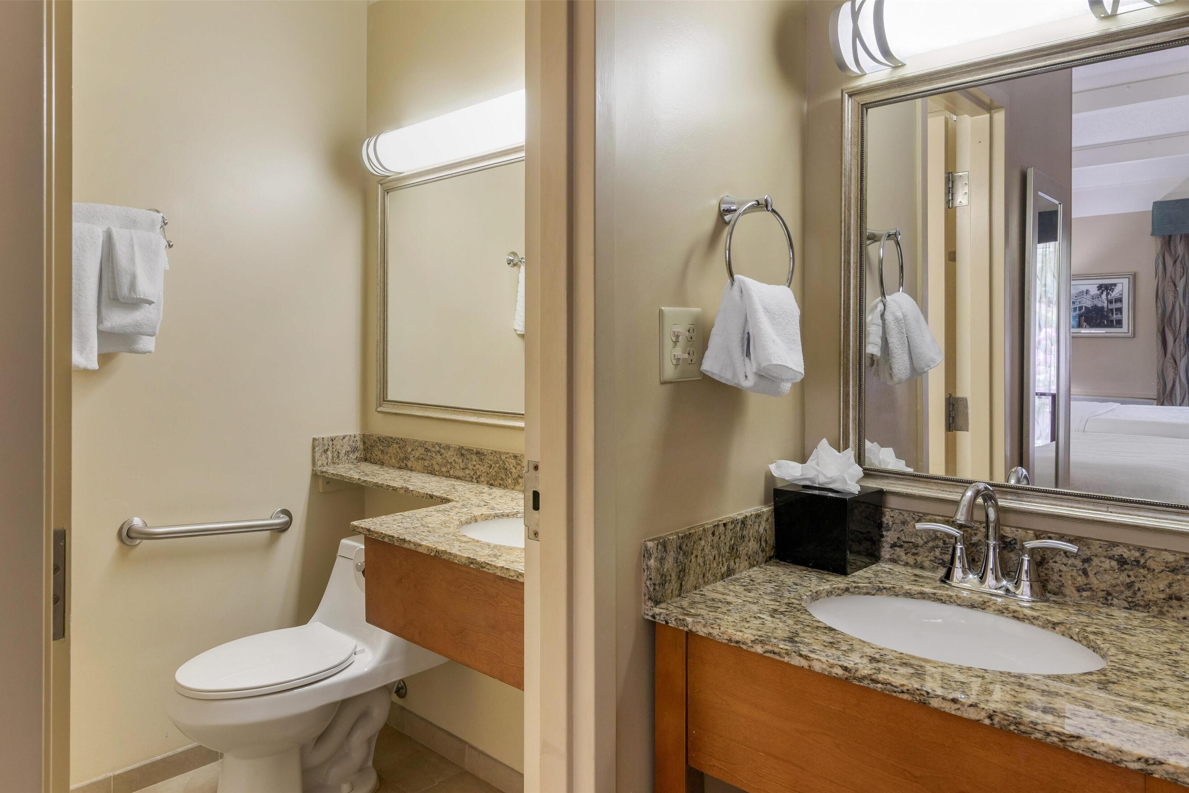 standard room, 2 queen beds, refrigerator & microwave, pool view | bathroom | combined shower/bathtub, free toiletries, hair dryer, towels