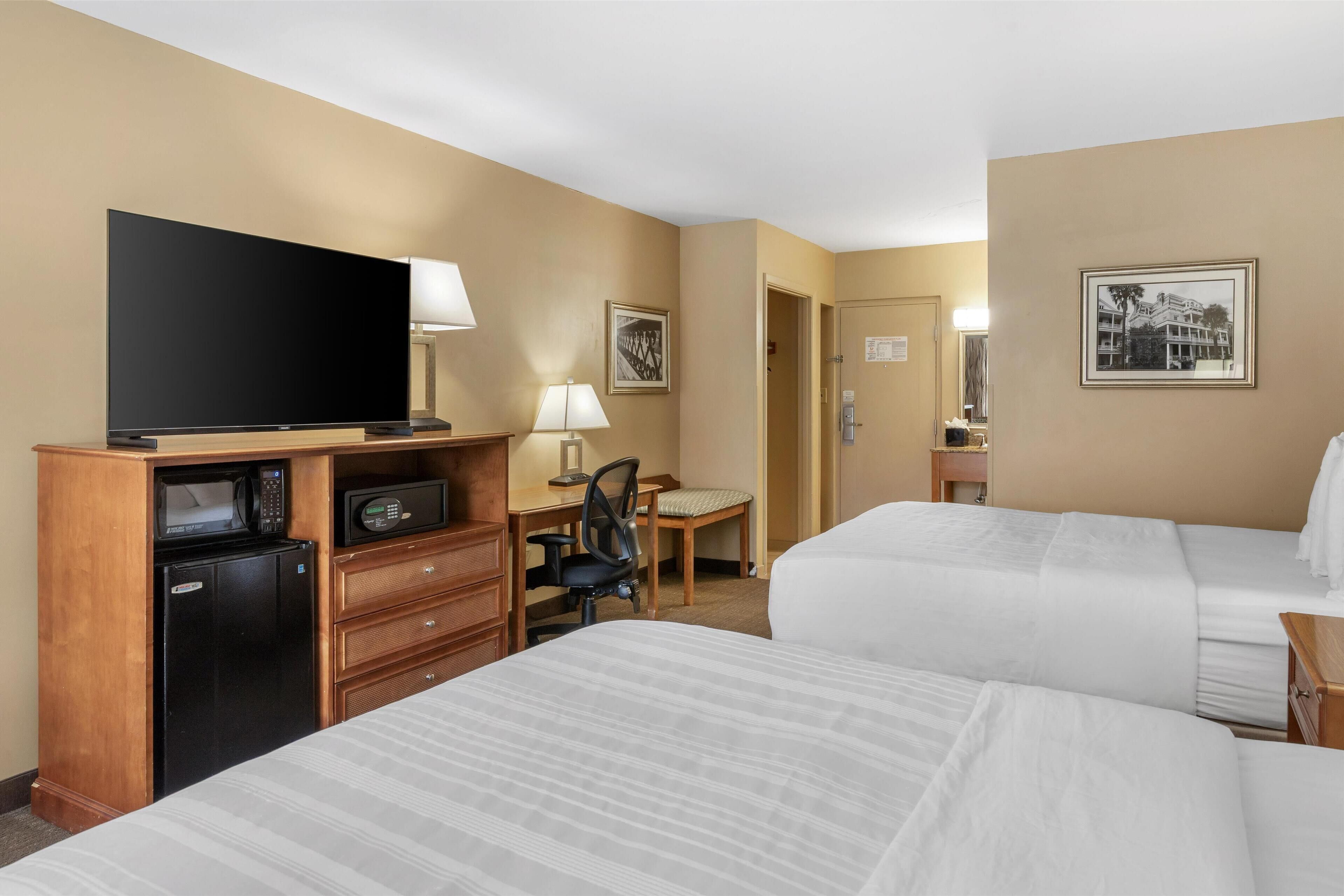 standard room, 2 queen beds, refrigerator & microwave, pool view | 1 bedroom, pillow-top beds, in-room safe, blackout curtains