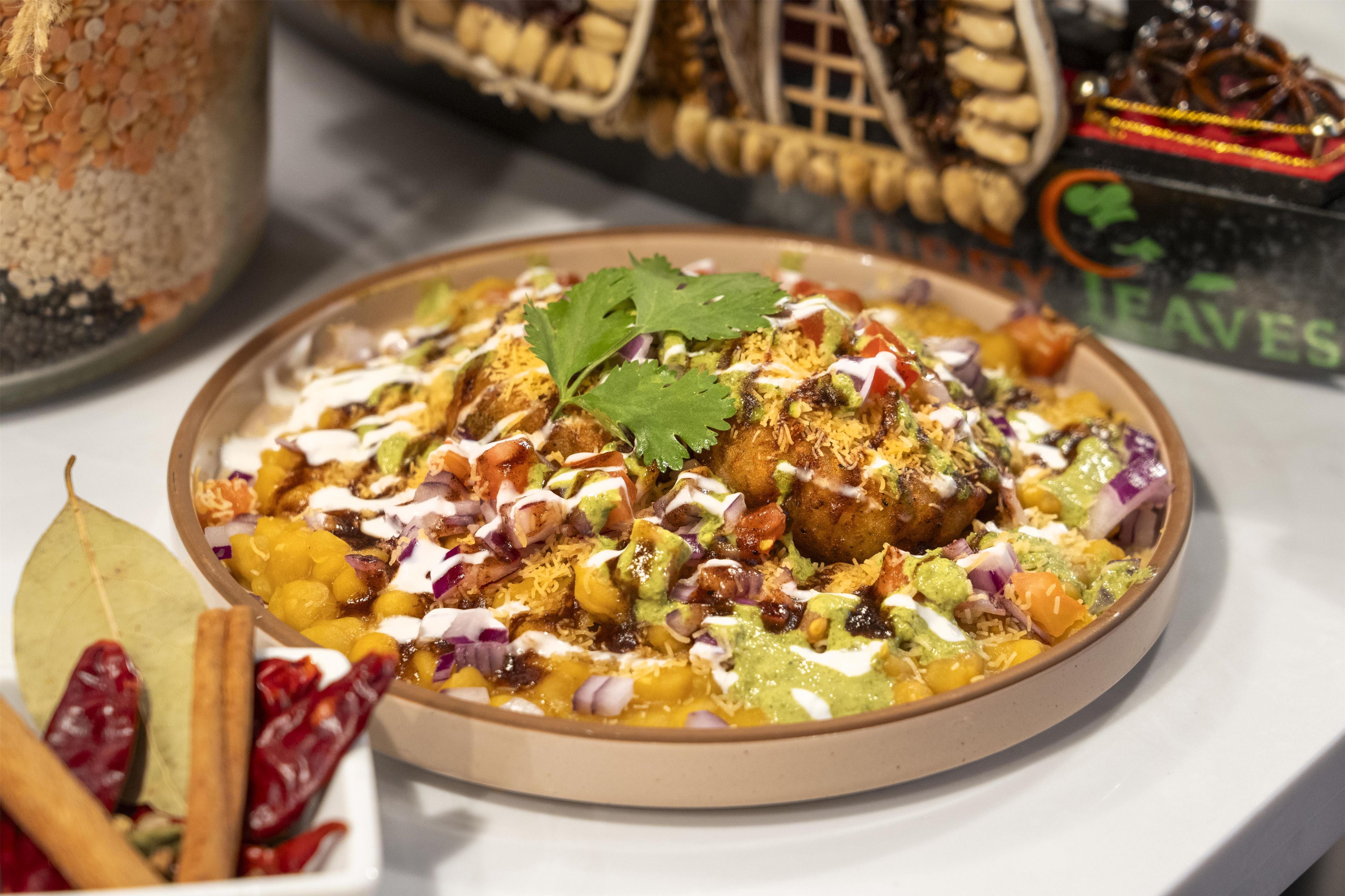 A plate of food with various toppings and garnishes.