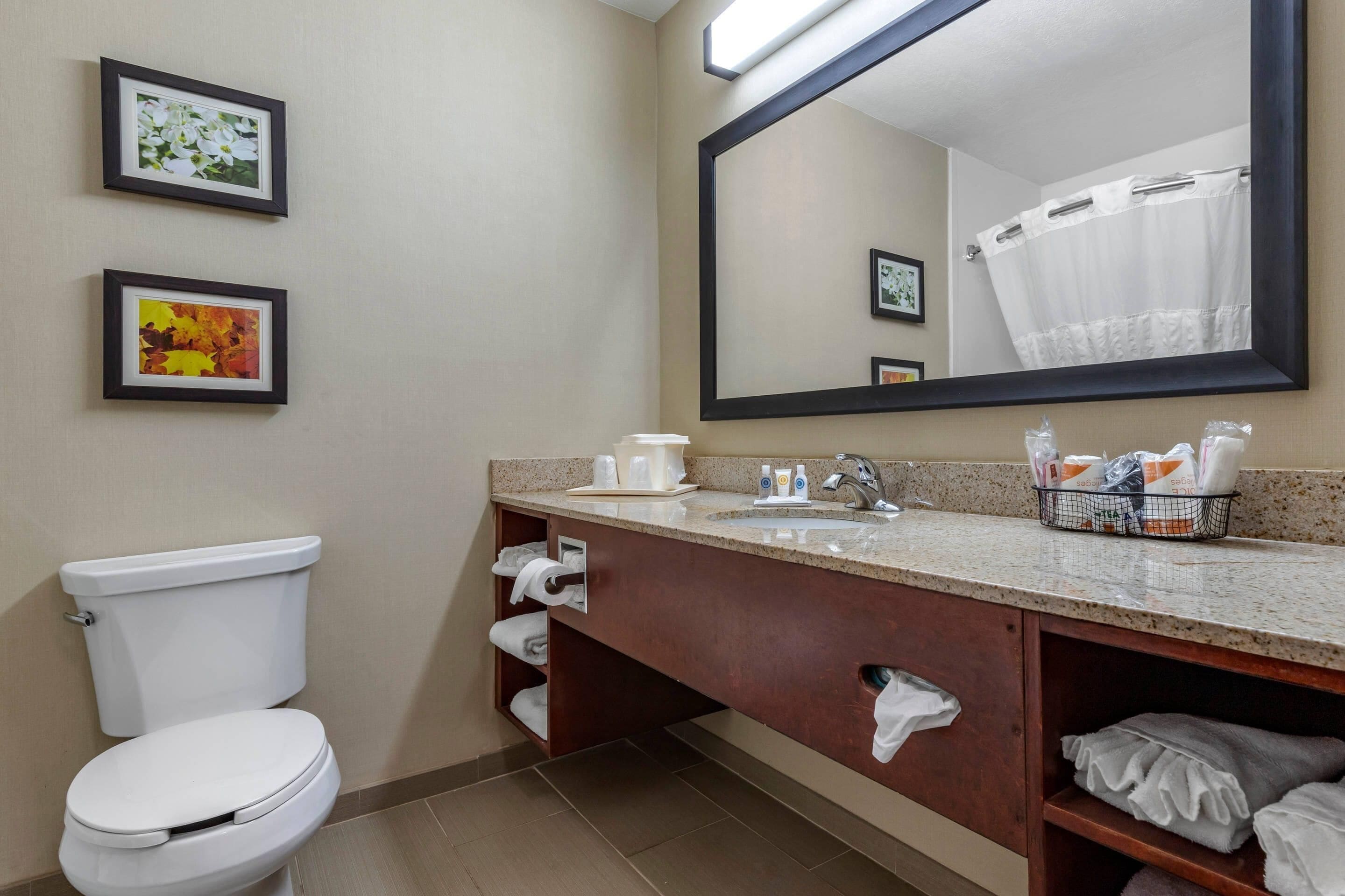 premium bedding, desk, laptop workspace, blackout curtains