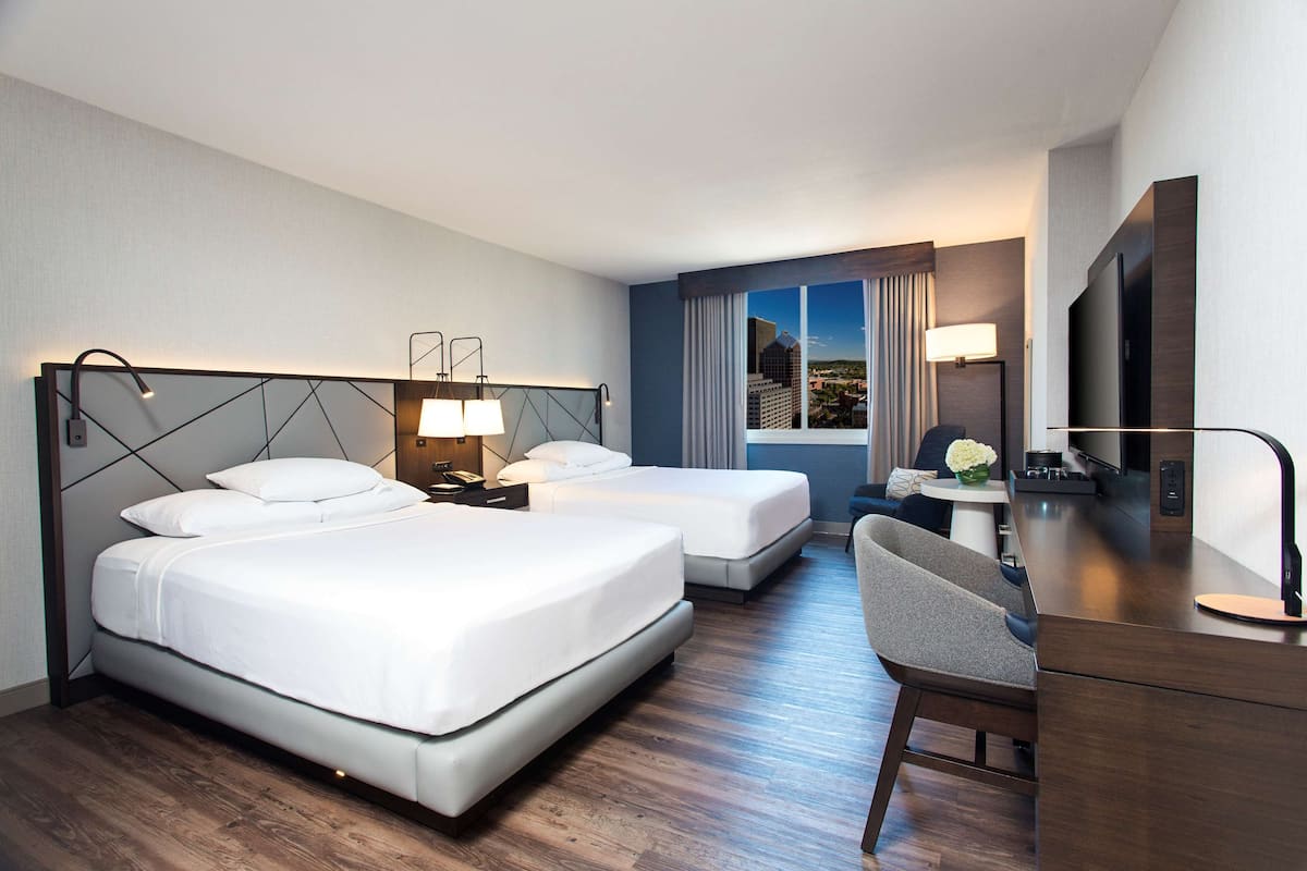 hypo-allergenic bedding, down duvets, pillow-top beds, in-room safe