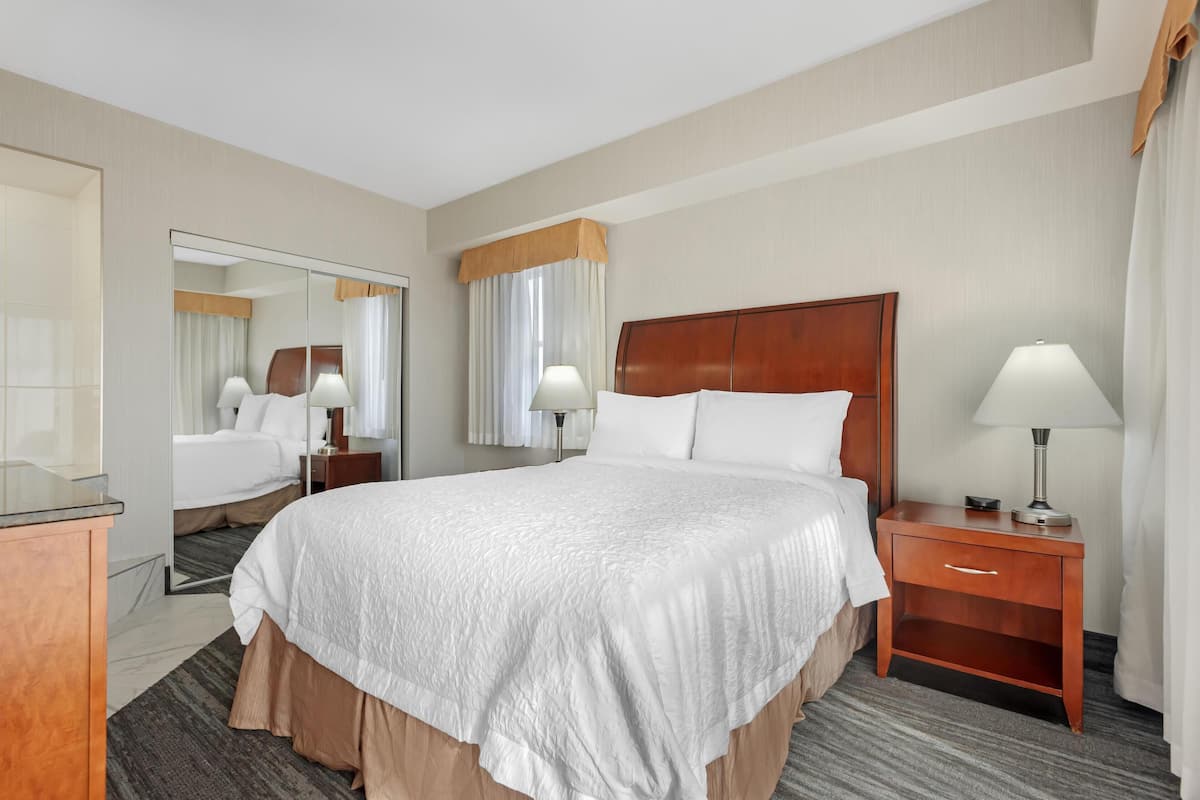 Suite, 1 Queen Bed, Non Smoking, Jetted Tub (Living Room;with Sofabed) | 2 bedrooms, premium bedding, pillow-top beds, in-room safe
