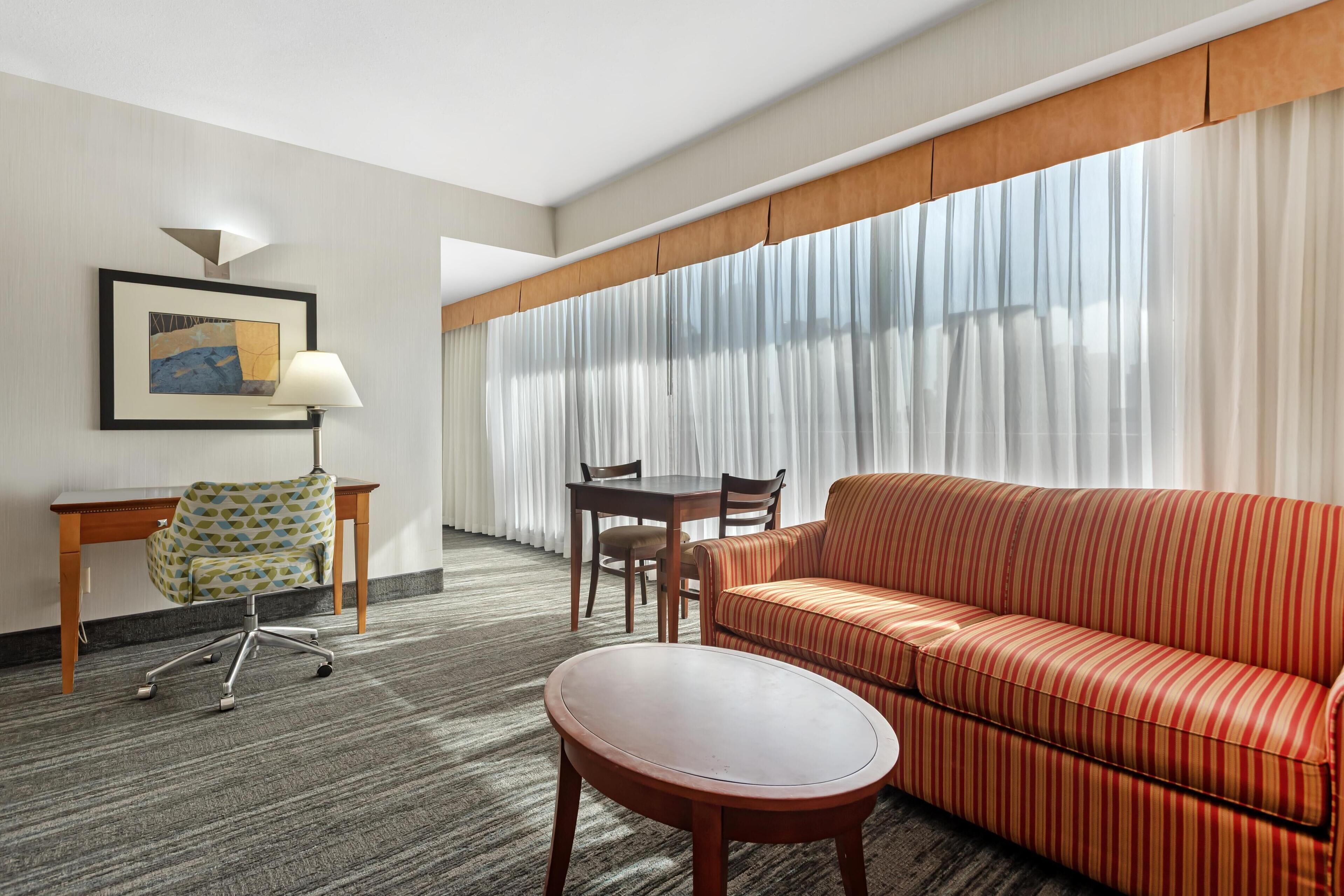 suite, 1 queen bed, non smoking, jetted tub (living room;with sofabed) | 2 bedrooms, premium bedding, pillow-top beds, in-room safe