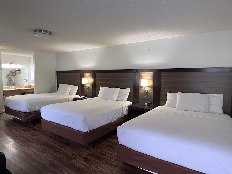 Family Room, 3 Queen Beds | Iron/ironing board, free cribs/infant beds, rollaway beds, free WiFi