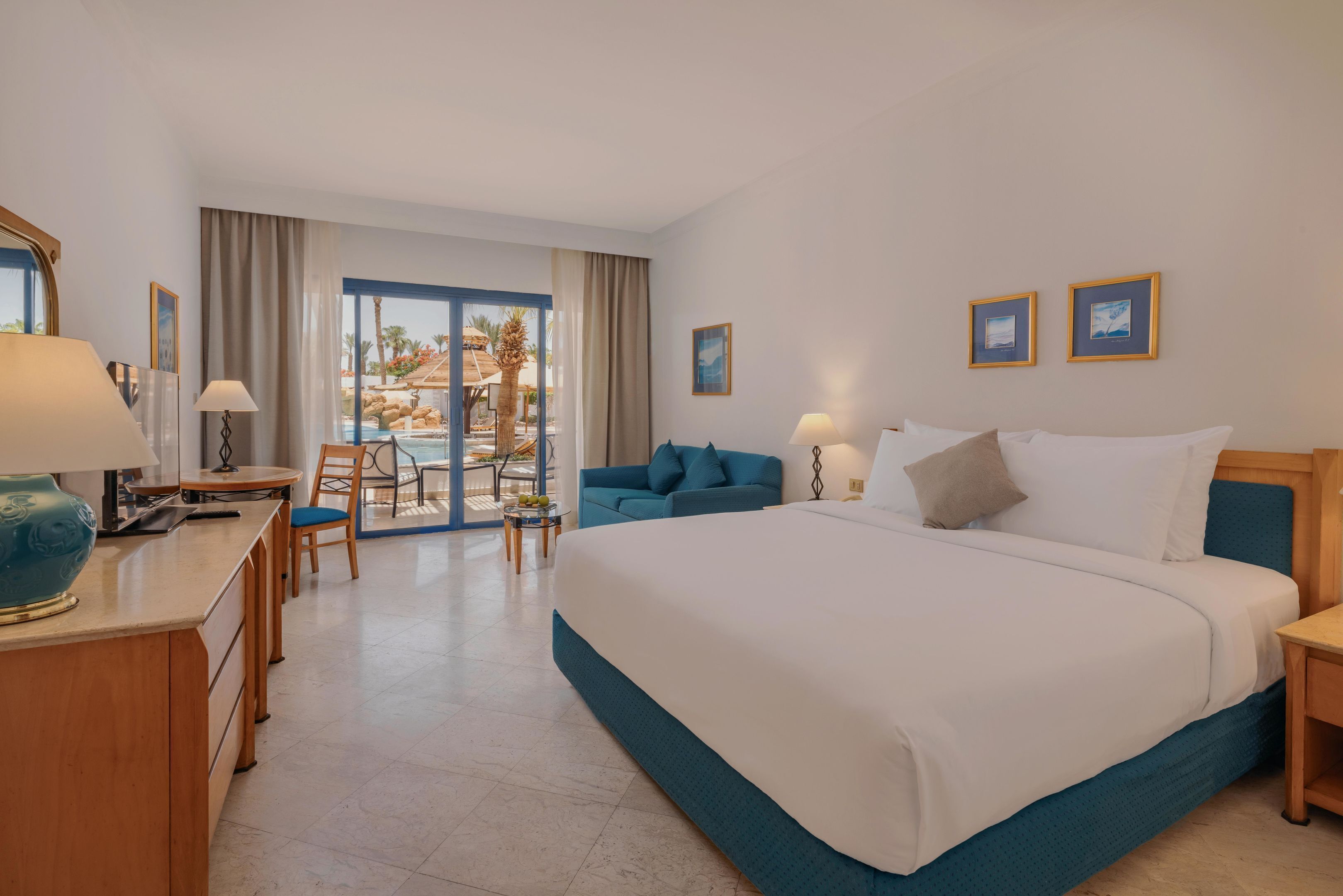 Superior Room, Pool View (Queen or Twin) | Minibar, in-room safe, desk, blackout drapes