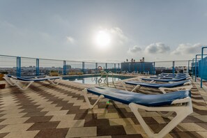 Outdoor pool, pool loungers