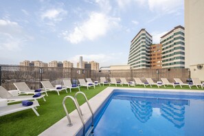 Outdoor pool, sun loungers