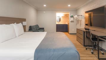 Chambre Deluxe, 1 trÚs grand lit, non-fumeur, réfrigérateur et four à micro-ondes