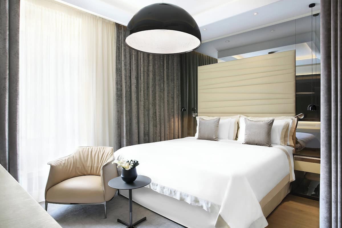 Premium bedding, down duvets, minibar, in-room safe