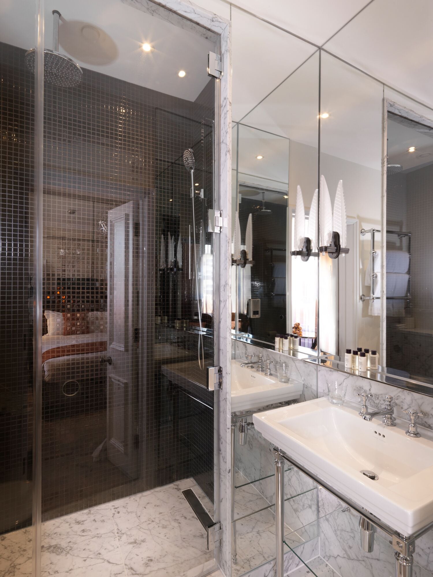 luxury one bedroom apartment | bathroom | designer toiletries, hair dryer, bathrobes, slippers