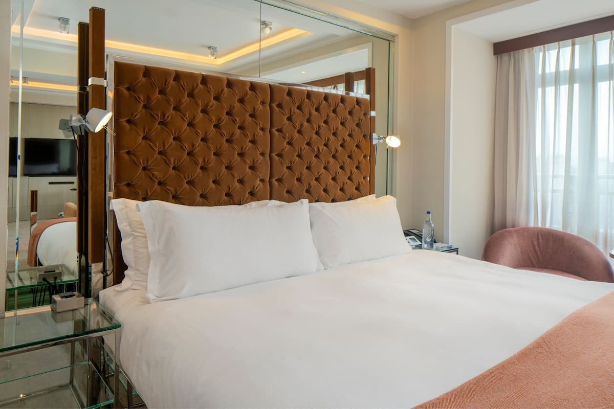 Designer toiletries, hair dryer, bathrobes, slippers