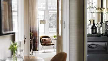 Luxury One Bedroom Apartment | Living area | 40-inch flat-screen TV with cable channels, TV, DVD player