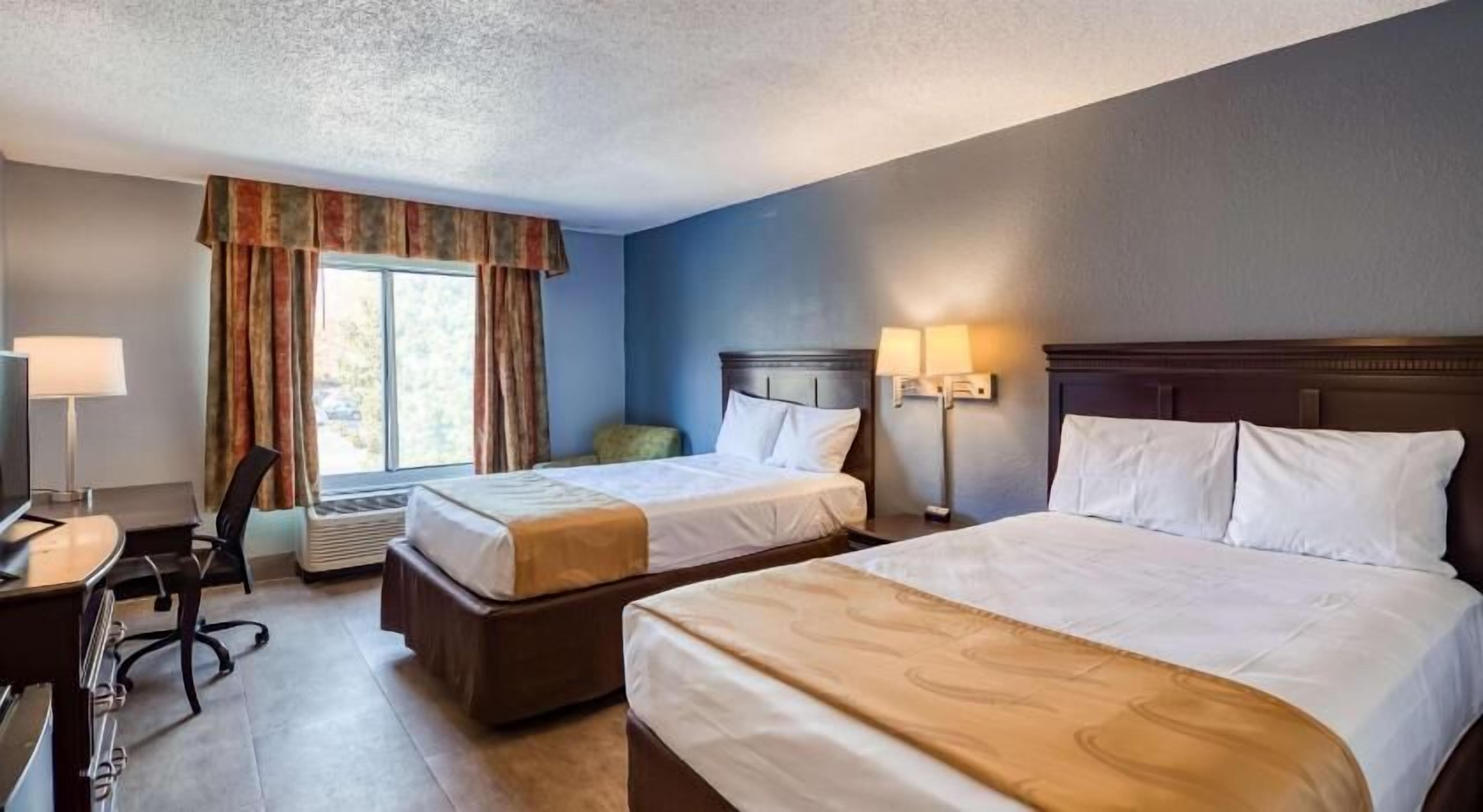 Pillowtop beds, desk, laptop workspace, blackout drapes