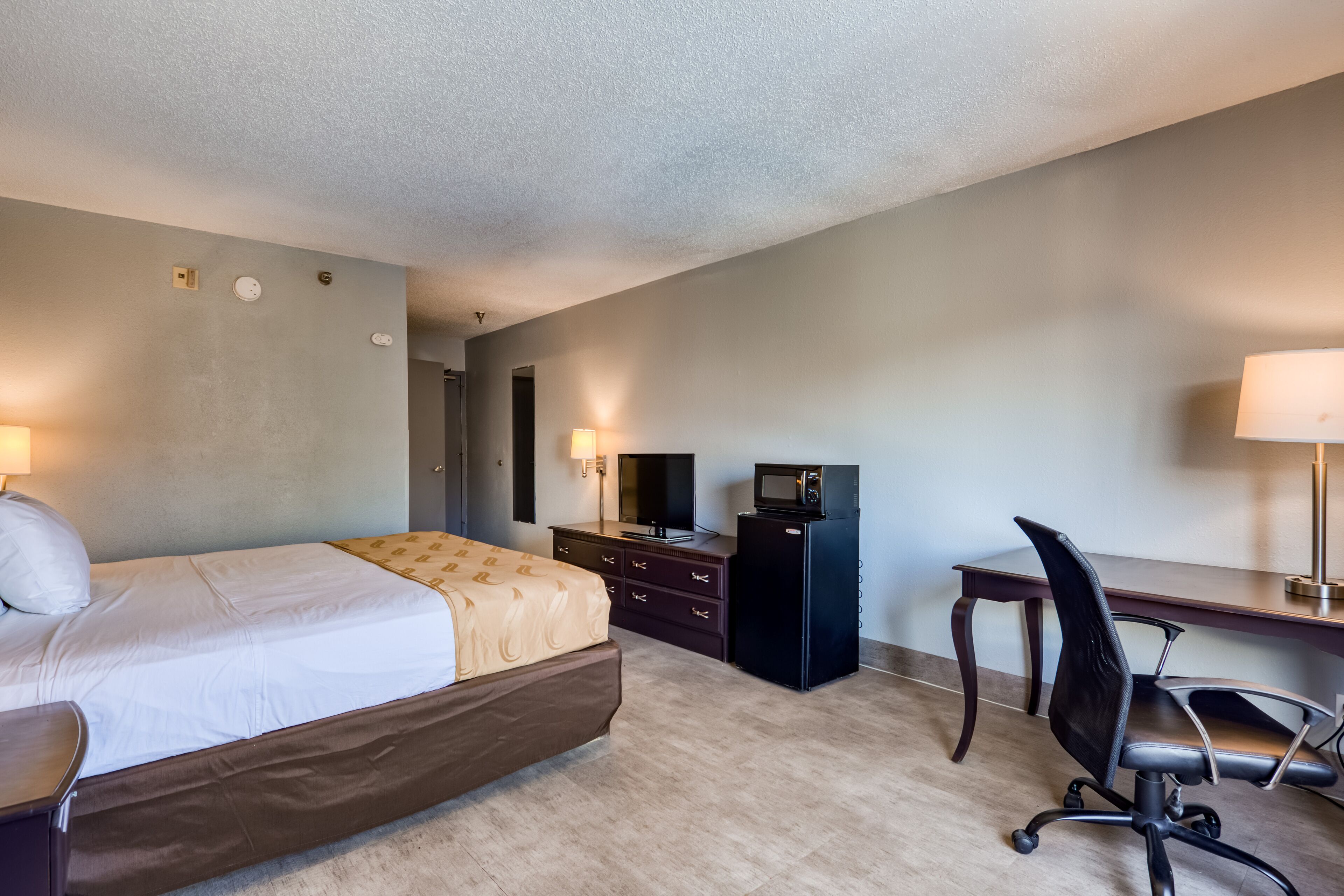 Pillow-top beds, desk, laptop workspace, blackout curtains
