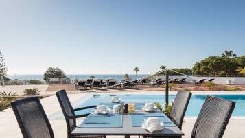 Breakfast, lunch, dinner served; international cuisine, pool views