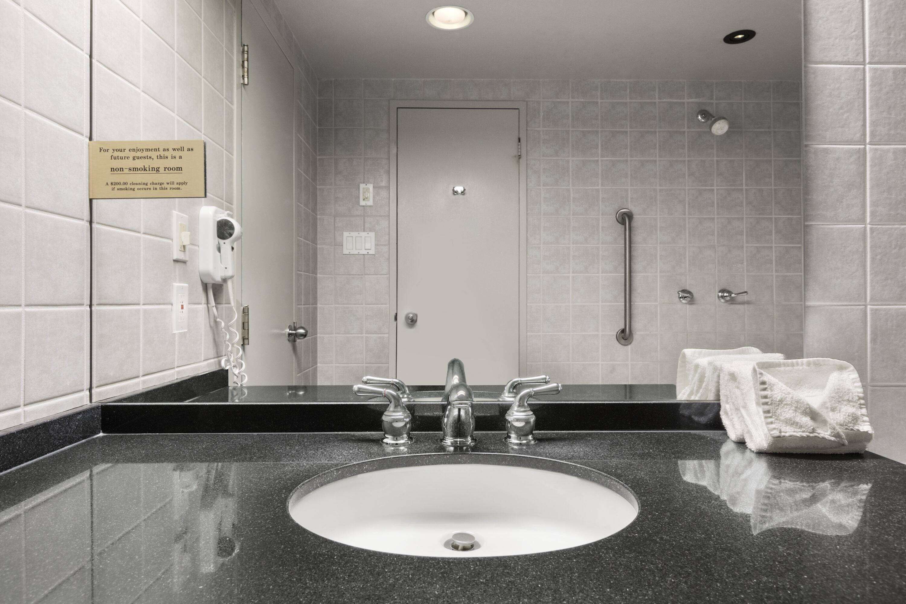 eco-friendly toiletries, hair dryer, towels